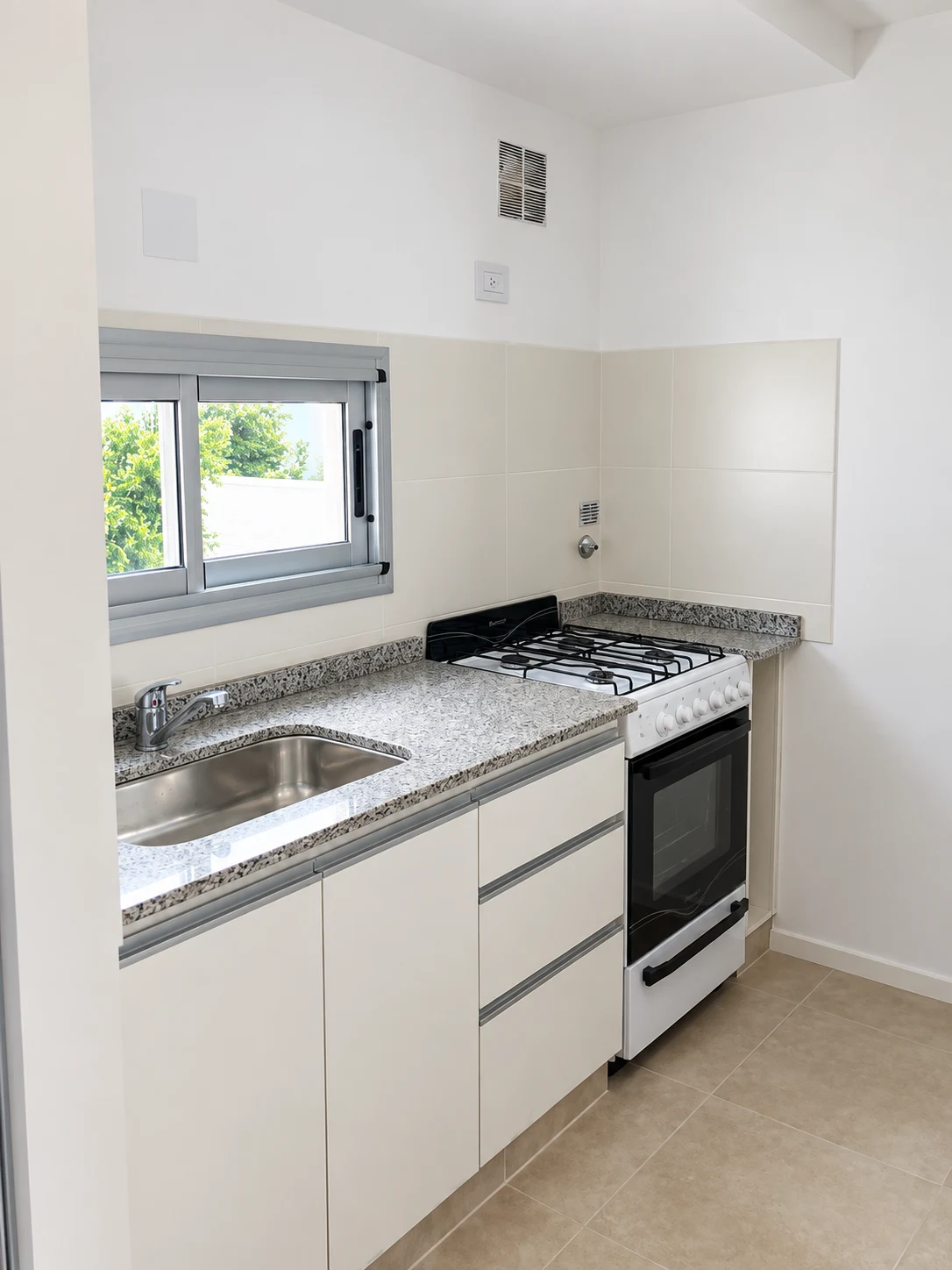 Cocina de un departamento del edificio E58 de Ductor