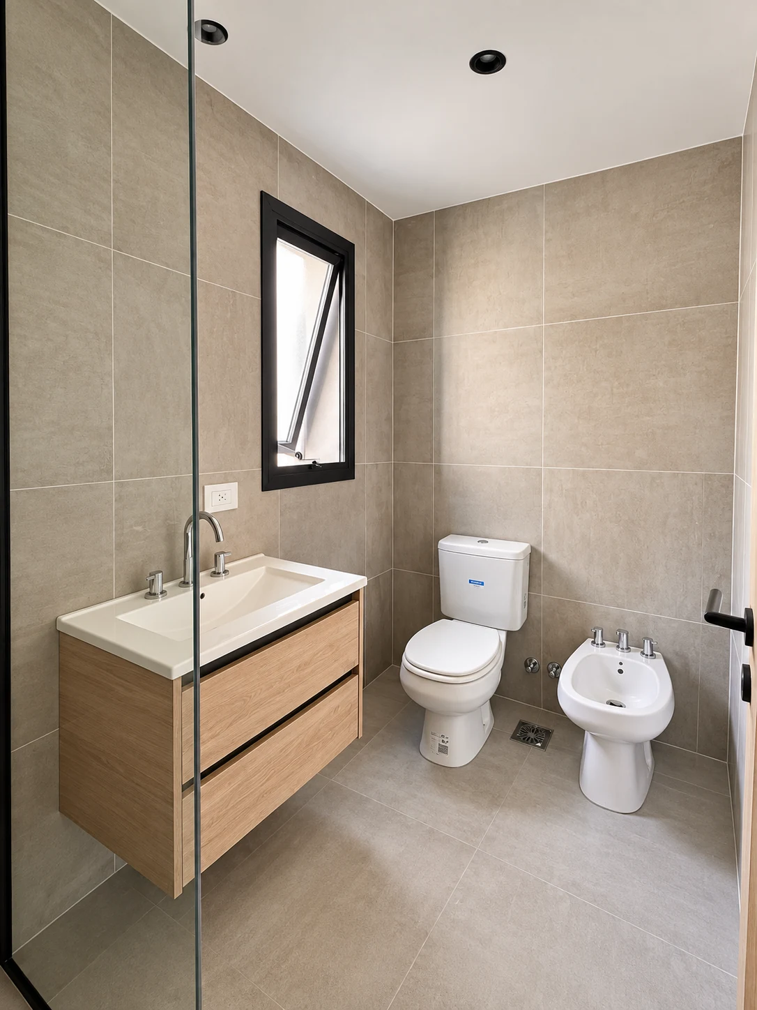 Baño terminado de un departamento Ductor